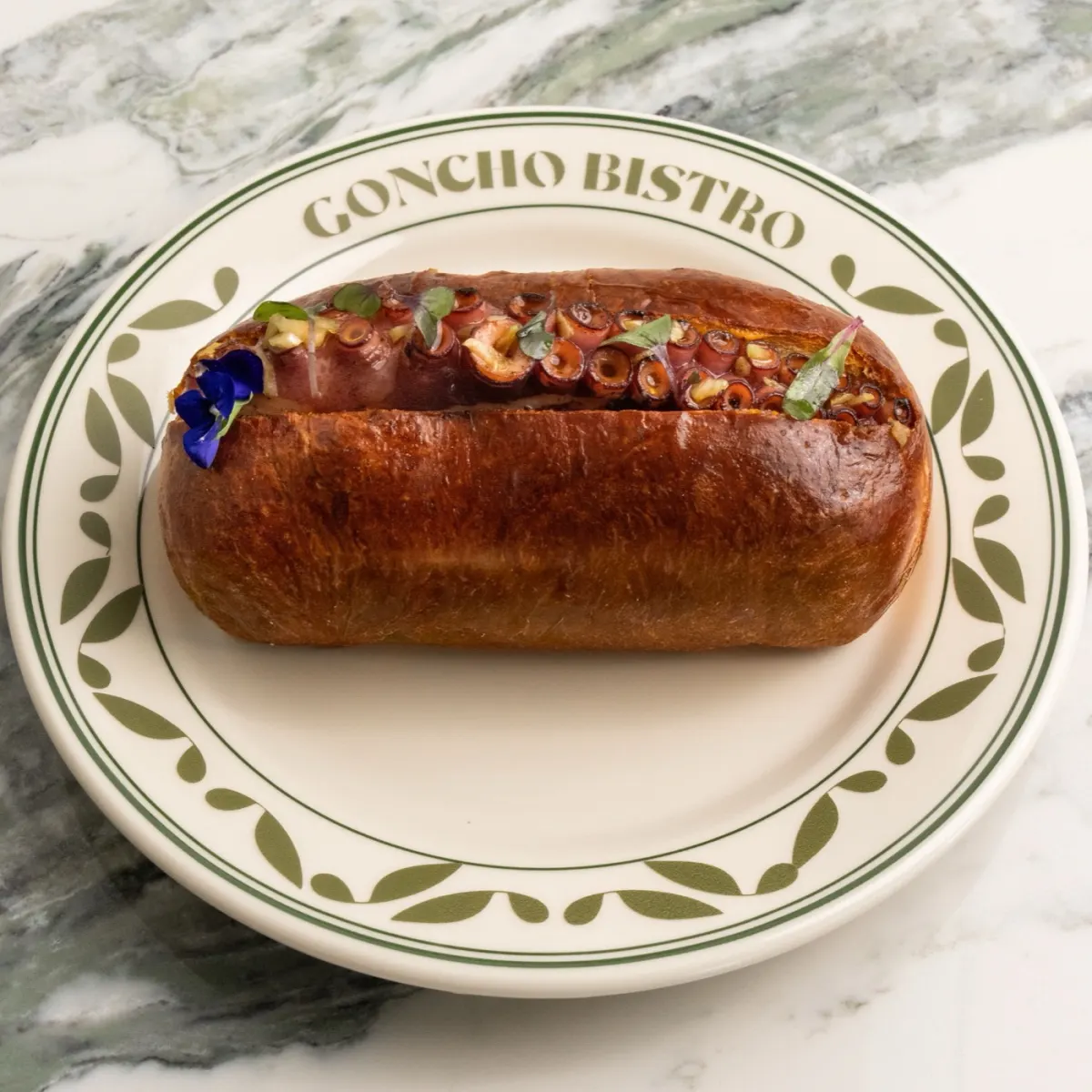 Octopus brioche with sweet potato puree