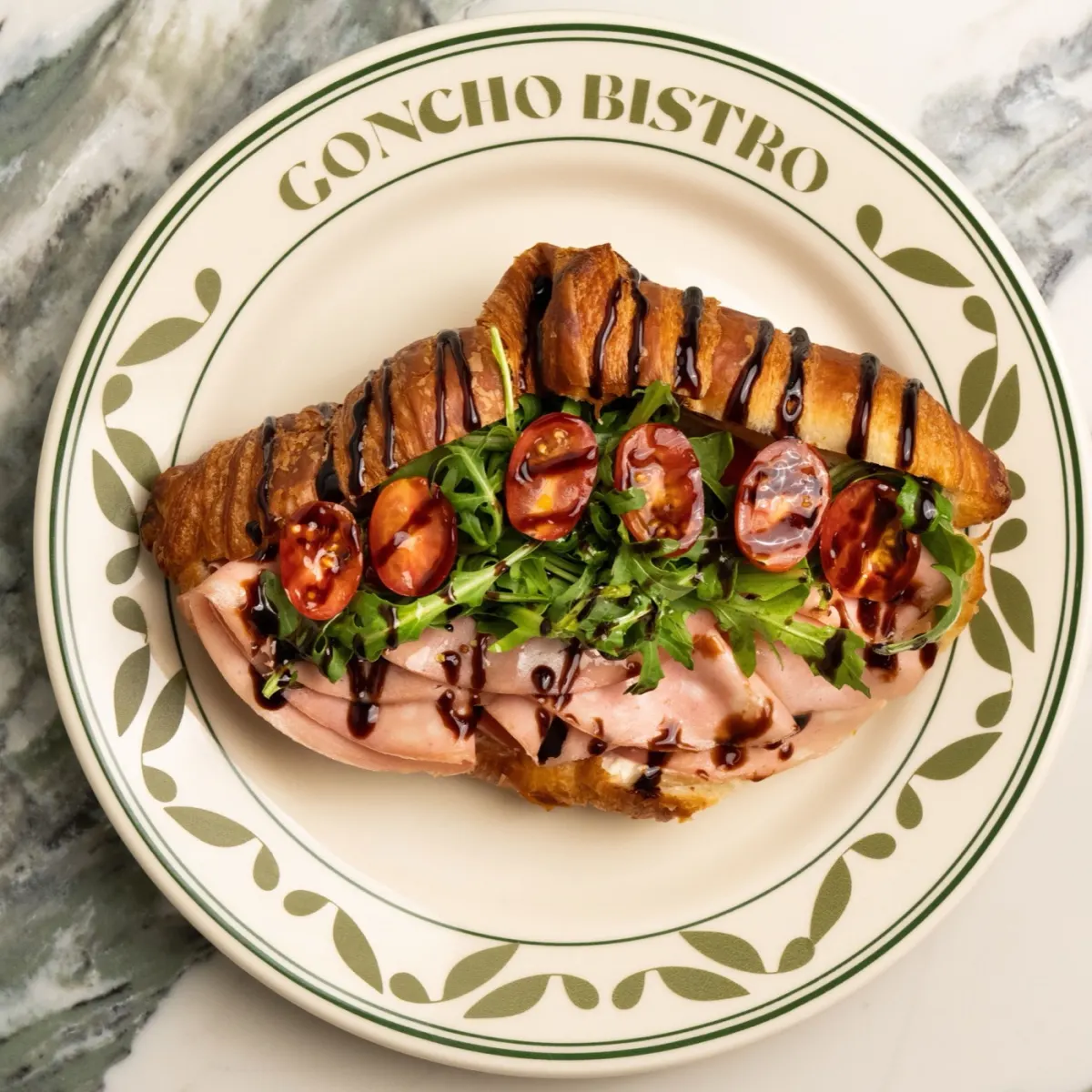 Stracciatella and mortadella croissant with pistachios