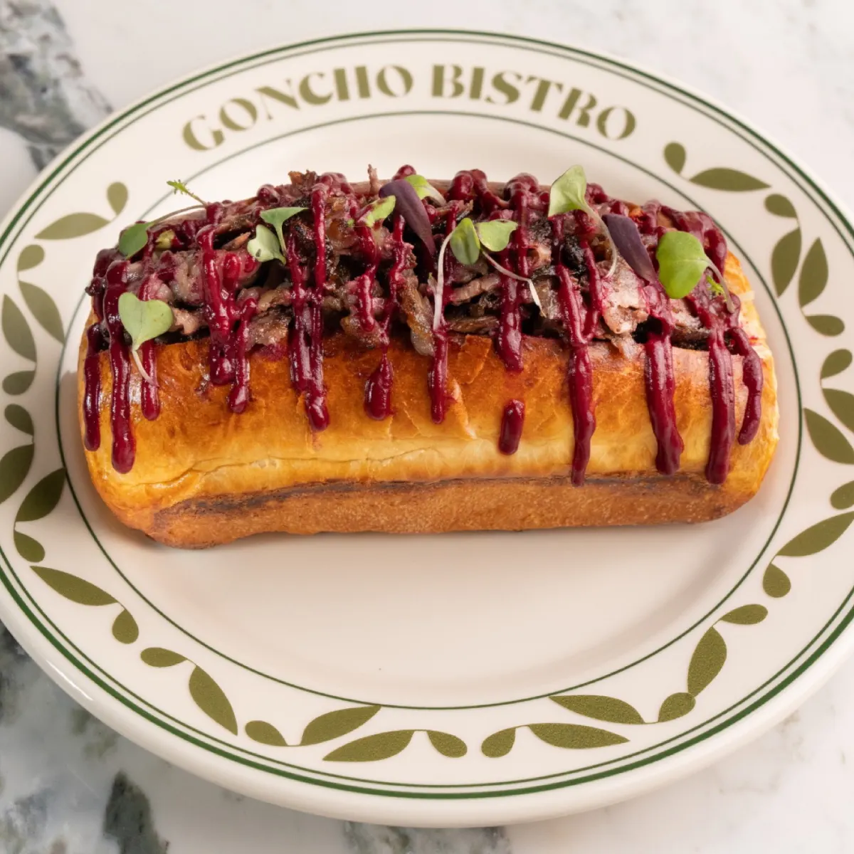 Wagyu beef brioche with beet-blueberry cream