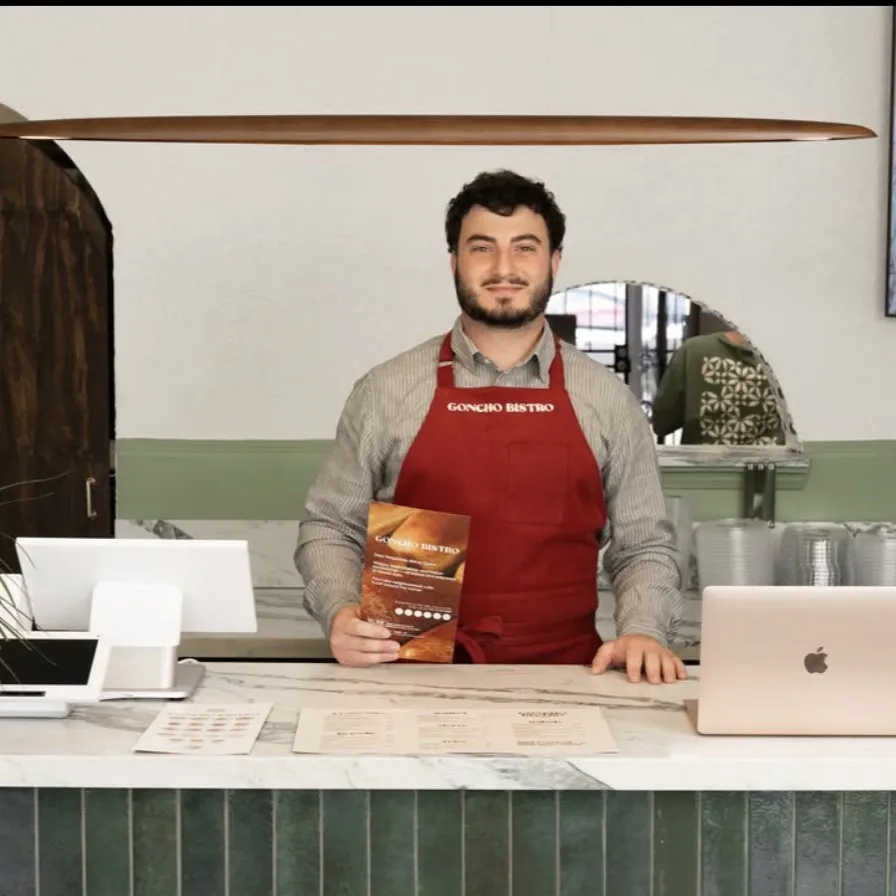 GONCHO BISTRO team member at the marble counter